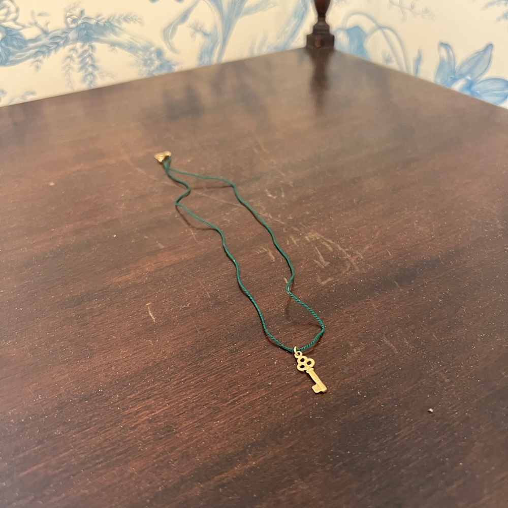 GOLD KEY NECKLACE